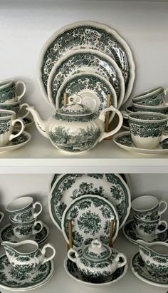 an assortment of green and white china