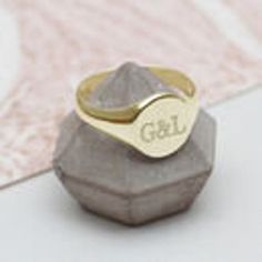 PRODUCT DESCRIPTION * A classic signet style ring personalised with the lucky recipients initials. * The perfect personalised gift. FREE GIFT BOX * Your order comes beautifully packaged in a free Hurleyburley gift box tied with a silk ribbon. We can add a gift card for your special message. FREE STANDARD UK DELIVERY * Our standard postage is by Royal Mail 1st class post which has delivery guidelines of 1-2 working days but is not guaranteed to arrive within this timeframe. * This item is availab Adjustable Initials Signet Ring For Wedding, Classic Initial Ring For Personalized Gift, Classic Engraved Ring With Hallmarks As Gift, Classic Engraved Ring With Hallmarks For Gift, Classic Personalized Name Ring, Adjustable Hallmarked Signet Ring As Gift, Custom Name Initial Ring As A Gift, Classic Engraved Ring For Personalized Gift, Classic Engraved Name Ring For Personalized Gift