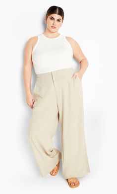 Channel your inner goddess with the Nala Pant. Exhibiting a wide-leg silhouette for a relaxed style, these pants are all you need to completely transform your wardrobe. Key Features Include: - Hook and eye with front zip closure - Back pockets - Pull on style - Wide leg relaxed silhouette - Full length Style with a sleeveless jacket and heels for an elevated look ideal for lunch with friends. | Plus Size Pant Nala 24 in Stone, Size 20/L | City Chic | Plus Size Pants Nala 24 in Stone, Size 20/L | Elevated Essentials, Ginger Dress, Chic Plus Size, Dresses Date Night, Linen Pant, Inner Goddess, Lingerie Dress, Sleeveless Jacket, Plus Size Pants