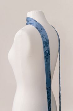 A chic accessory to dress up your bridal party or to glam up your wedding day look, this scarf can transition to any special occasion you are attending! Measures 86 inches in length and 2 inches in width. Elegant White Silk Scarf For Wedding, Blue Silk Scarf For Wedding, Elegant Embroidered Wedding Scarf, Elegant Floral Print Wedding Scarves, White Silk Scarf With Floral Print, Wedding Parties Colors, Blue Bouquet, Blush Bride, Bridesmaid Dress Colors