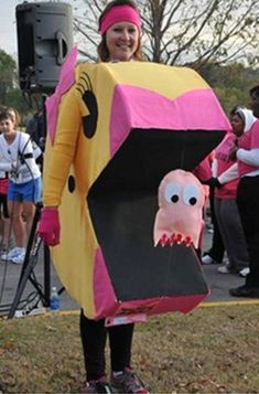 a woman in a pink and yellow costume