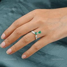 A dazzling touch of Zambian Emerald over the 18k White Gold base which adds up to the elegance of the ornament. An elegant Ring of adornment that would definitely grab attention! ✧✧Welcome To Our Shop Spectrum Jewels India✧✧ ""18k White Gold Zambian Emerald Ring For Women, Natural Diamond Statement Ring For Birthday Gift, Valentine Ring Jewelry For Wife"" ★PRODUCT SPECIFICATION★ * ITEM CODE - SER-22631 * METAL - 18k White Gold * 18k White Gold Weight : 3.12 gm  * GROSS WEIGHT - 3.42 gm Approx * Diamond Earrings Design, Statement Rings Diamond, Gift Valentine, Zambian Emerald, Yellow Gold Bracelet, Women Ring, Diamond Hoop Earrings, Yellow Gold Earring, Elegant Ring