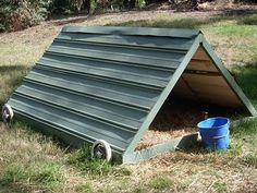 a dog house built into the ground