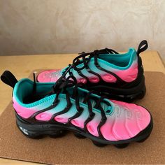 Nike Womens Air Vapormax Plus Pink Blast, Black, And Jade Color Running Shoe In Size 7 The Shoe Is Designed For Comfort And Performance With Slip Resistant Lightweight And Breathable Features The Lace-Ip Closure Ensures A Secure Fit While The Rubber Pods On The Outsole Help With Durability And Traction For Many Activities Such As Running, Walking Etc Great Looking Shoe Used But In Good Condition See Enclosed Pictures Very Comfortable Pink Dynamic Sneakers With Round Toe, Dynamic Pink Sneakers With Air Cushioning, Dynamic Pink Round Toe Sneakers, Dynamic Pink Running Shoes With Air Cushioning, Pink Dynamic Round Toe Sneakers, Dynamic Pink Sneakers With Air Max Cushioning, Pink Dynamic Sneakers With Air Cushioning, Pink Dynamic Running Shoes With Air Max Cushioning, Dynamic Pink Running Shoes With Abzorb Midsole