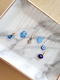 "14k Solid Gold Opal Evil Eye Necklace - 14k Gold Opal Blue Necklace - Protection Necklace - Fine Jewelry - Gift for Women The Solid Gold Opal Blue Evil Eye Necklace \"Protection\" for Women is composed of high-quality 14 Karat Gold. The evil eye figure is the most preferred amulet for eliminating bad energy. Destroying the effects of bad looks, it offers a simple yet beautiful detail on your neck. 🔳WARRANTY🔳 *6 Months warranty. *Free Shipping without price limit. *Easy Return and Replacement Spiritual Evil Eye Pendant Necklace, Blue Evil Eye Pendant Necklace, Elegant 14k Gold-filled Evil Eye Jewelry, Blue Metal Evil Eye Necklace, Spiritual Evil Eye Metal Necklace, Handmade Evil Eye, Evil Eye Necklace Gold, Graduation Jewelry, Protection Necklace