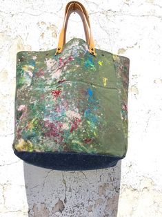 Hand Painted Military Canvas & Leather Tote Bag/Splatter Paint | Etsy Eco-friendly Canvas Bucket Bag, Green Waxed Canvas Tote Bag, Eco-friendly Upcycled Canvas Bag, Vintage Upcycled Canvas Bag, Upcycled Canvas Bag For Everyday Use, Upcycled Everyday Canvas Bag, Upcycled Canvas Tote Bag, Artsy Canvas Bags For Everyday, Artsy Canvas Tote Bag