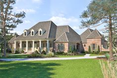 this is an artist's rendering of the front of a house in a country setting