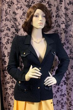 Classy, black, 100% wool tweed button up blazer. The pockets have Golden lion embossed buttons with a satin trim boarder. Faux welt flap (4) pockets. This coat has sharp features including chain crochet piping with dramatic pointed cuffs,so stylish!  Measurements:  Shoulders: 17" Bust: 34" Waist: 32" Hips: 32" Length: 12" Sleeve: 25" *The condition of item is consistent with age Tailored Black Blazer With Gold Buttons, Luxury Black Blazer With Gold Buttons, Designer Black Tweed Long Sleeve Jacket, Designer Black Tweed Jacket With Long Sleeves, Tailored Black Outerwear With Gold Buttons, Black Wool Party Blazer, Black Tweed Jacket For Winter Formal Events, Black Tweed Jacket For Winter Formal, Black Formal Tweed Jacket For Winter