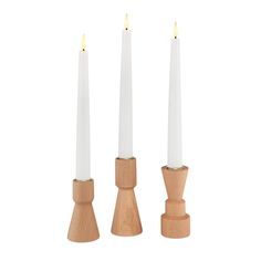 three wooden candlesticks with one white candle and the other light on each side