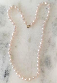 "Natural Faux Pearl Necklace with Gold Tone Spring Ring Clasp Pearls Measure 8mm in Diameter ( 1/4\" in Diameter ) Mot Pearls are Natural Pearl Color 16\" 7.00 18\" 8.50 24\" 9.50 29\" 10.50 36\" 10.50 Endless ( without clasp ) 46\" 11.00 Endless ( without clasp ) COMPLIMENTARY DOMESTIC SHIPPING" Classic Adjustable Rose Gold Necklaces, Classic Adjustable Rose Gold Necklace, Classic Single Strand Jewelry For Everyday, Feminine Single Strand Round Beads Jewelry, Feminine Single Strand Jewelry With Round Beads, Classic Hypoallergenic Necklaces For Anniversary, Classic Hypoallergenic Necklace For Anniversary, Elegant Pink Necklaces For Everyday, Elegant Pink Necklace For Everyday Wear