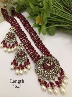 Victorian Style Jewelry necklace of Pearl and Beads with matching earrings Perfect for any kind of occasions and ceremonies. You can wear it with Saree lehenga and Evening Gowns. Highest quality and craftsmanship. Arrives in box Please let me know if you have any questions Red Round Pearl Jewelry, Red Pearl Drop Jewelry For Anniversary, Festive Red Necklaces With Matching Earrings, Festive Red Necklace With Matching Earrings, Wedding Necklaces With Dangling Round Beads, Traditional Jewelry For Valentine's Day Celebration, Elegant Red Kundan Bridal Necklace, Festive Red Pearl Jewelry, Elegant Red Bridal Sets For Celebration