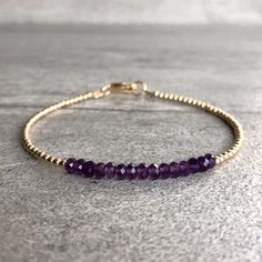 #gemsbykelley #amethyst #bracelets #goldbracelets #crystalsandgemstones #jewelry #delicatejewelryPurple Amethyst Bracelet | Tiny Silver or Gold Beads | Dainty Delicate Amethyst Jewelry | February Birthstone Gift for Women | Faceted Gemstone Bracelet Elegant Purple Birthstone Beaded Bracelets, Gold Amethyst Beaded Bracelets, Gold Amethyst Beaded Bracelets For Jewelry Making, Adjustable Amethyst Beaded Bracelets With Birthstone, Gold Beaded Amethyst Bracelets, Everyday Purple Hand-strung Jewelry, Dainty Purple Beaded Jewelry, Beaded Amethyst Rondelle Jewelry, Amethyst Beaded Bracelet