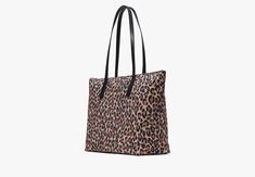 You know this tote holds your everyday stuff like a wallet keys phone sunglasses. It also holds: two red lipsticks $6 in change 11 crumpled receipts an avocado… | Kate Spade Kitt Nylon Leopard Extra Large Tote, Brown Multi Pvc Trim, Kate Spade Outlet, Logo Line, Large Tote, Lipsticks, Tote Handbags, Avocado, Extra Large, Outlet