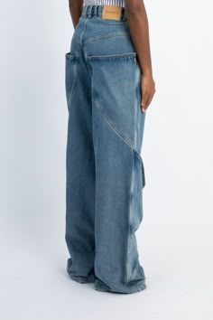 Blending classic denim with high-fashion draping, these denim trousers from The Attico's Fall/Winter 2024 collection feature paneling throughout and are cut for a slouchy silhouette. Duke Kaboom, Denim 2024, Subversive Fashion, Cargo Coat, Fashion Draping, Biker Fashion, Pant Design, Cuff Pants, Cool Pants