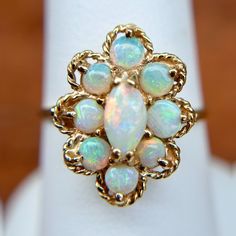 14KT Yellow Gold Multi Toned Opal Ring Size 7 Can be resized for an additional fee] Stamped 14K Very Good Condition Stunning, interesting piece Check out all our gemstone rings + our entire jewelry collection! Please let us know if you have any questions. Thank you, Legacy Saint Jewelry Saint Jewelry, Marquise Ring, Gold Gift, First Contact, White Band, Opal Ring, Jewelry Inspo, Ring Size 7, Opal Rings