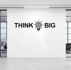 think big wall decal in an office with white walls and black lettering on the wall