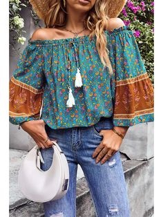 Experience the perfect balance of style and comfort with our Jamie Off Shoulder Long Sleeve Drawstring Floral Top. The off-shoulder design adds a touch of elegance, while the adjustable drawstring allows for a personalized fit. Make a statement with the vibrant floral print and feel confident in every step. Spring Multicolor Tops With Drawstring, Multicolor Off-shoulder Bohemian Tops, Bohemian Off-shoulder Multicolor Tops, Bohemian Multicolor Off-shoulder Tops, Floral Print Off-shoulder Top For Summer, Bohemian Long Sleeve Off-shoulder Top For Vacation, Casual Floral Print Off-shoulder Top For Spring, Casual Green Off-shoulder Summer Top, Bohemian Off-shoulder Top For Beach