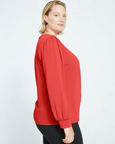 Going to work? Going to dinner? This top works overtime and can be worn to both. Made from a drapey fine crepe jersey, it features a crossover front and an elegantly skimming silhouette. The flowy look is so luxe and the cuffed sleeves have just the right volume. Red V-neck Blouse With Button Closure, Vibrant Red V-neck Top, Puffer Vest Fashion, Stretch Red Moisture-wicking T-shirt, Vermilion Red, Athleisure Pants, Red V-neck Rayon Blouse, Red Stretch Tops With 3/4 Sleeves, Weekend Dresses