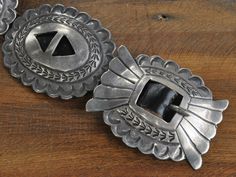 "Beautiful vintage Navajo sterling silver concho belt with 10 conchos and a matching buckle on a black leather belt. The buckle measures about 2 1/2\" wide and 1 3/4\" tall. Each of the conchos is about 2 3/4\" wide and 2 1/4\" tall. The black leather belt is about 32\" long laid flat, but it can be replaced to fit most waist sizes. This piece is not marked, but is guaranteed to be sterling silver. Stunning vintage concho belt! Feel free to ask any questions and thank you for looking! CB-2" Southwestern Silver Concho Belt, Silver Southwestern Concho Belt, Traditional Silver Concho Belt, Southwestern Concho Belt Buckles For Ranch, Bohemian Concho Belt Buckles For Western-themed Events, Traditional Concho Belt Buckles For Western-themed Events, Southwestern Concho Belt For Western-themed Events, Black Concho Belt Buckles For Ranch, Black Concho Belt Buckles