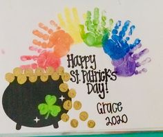 a handprinted st patrick's day card with shamrocks and gold coins