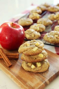 apples and cinnamon cookies on a cutting board