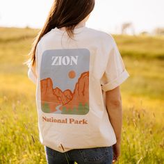 Inspired by our trip through the western USA, the Zion National Park shirt made from 100% organic cotton. Thanks to the organic cotton, our clothing feels wonderfully soft on the skin and is also sustainable. The cotton used comes from 100% organic farming. In addition, all of our shirts are OEKO-Tex Standard, FairWear and PETA certified. Your shirt will only be produced for you once your order has been received. This means that each of you receives a unique piece and we also protect the environ National Park Shirts, National Park Shirt, Zion National Park, Organic Farming, Mom Birthday, Peta, Agriculture, National Park, Gender Neutral