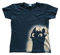 a t - shirt with an image of a cartoon character on the front and back