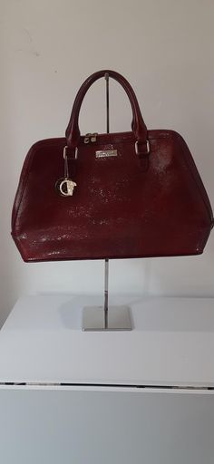 Versace Collection stunning large red satchel bag.  Gorgeous bag. It measures approximately  18" L. 12" H. 7" D. 6" Drop Like New.  It looks like it was never used.  The only flaw I see is tiny scuff on front bottom edge as seen in last photo. Designer Burgundy Satchel Bag, Designer Burgundy Satchel With Top Handle, Designer Burgundy Top Handle Satchel, Designer Burgundy Satchel With Detachable Handle, Classic Red Handheld Satchel, Classic Handheld Red Satchel, Designer Burgundy Satchel For Evening, Red Satchel With Handle Drop For Office, Designer Burgundy Satchel For Shopping