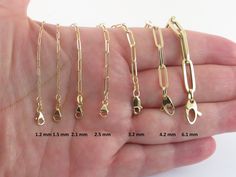 "Fabulous Solid 14k Yellow Gold Paperclip Chain Necklace!! Material: Real 14k gold. Stamped on the clasp Available length:16\" ,18\" , 20\", 24\" Width: 1.5 , 2.1 , 2.5 , 3.3 ,4.2 , 6.1 mm Clasp: Lobster lock 1.2 mm: Solid links 16\" = 1.5  g 18\" = 1.7  g 20\"= 1.9  g 1.5 mm : Solid links Length and avg weight: 16\" = 1.70  g 18\" = 1.90  g 20\"= 2.20  g 24\"= 2.50  g 2.1 mm: Solid links Length and avg weight: 16\" = 2.90  g 18\" = 3.20  g 20\"= 3.50  g 24\"= 4.20  g 2.5 mm : Solid links Length Staple Necklace, Gift Box Images, Chain Lock, Star Chain, Travel Jewelry, Photo Instagram, Gold Chain Necklace, Paper Clip, Fashion Makeup