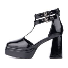 Featuring double platform heels and a t-strap style, you'll look stylish while also slaying! Dual buckle straps add a touch of flair while the zip closure adds convenience. The round toe gives an extra edge of sophistication, and the patent vegan leather brings quality that lasts. Mary Jane High Heel Platform Sandals, Platform Mary Jane Heels For Night Out, Edgy Platform Heels With Ankle Strap, Edgy Ankle Strap Heels For Concert, High Heel Heels For Spring Concert, Punk Chunky Platform Heels With Ankle Strap, Black T-strap Heels For Night Out, High Heels For Spring Concert, High Heels For Concert In Spring