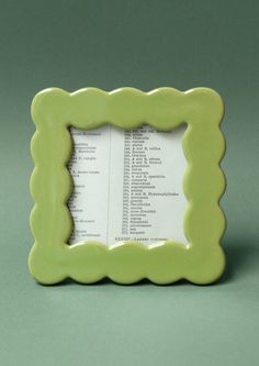 A square picture frame in wavy squiggle shape in meadow green ceramic. Ceramic Picture Holder, Ceramic Picture Frame Ideas, Pottery Picture Frame, Ceramic Picture Frame, Ceramic Frame, Green Square, Home Decor Pictures, Picture Frame, Picture Frames