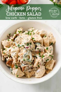 chicken salad in a white bowl with green onions and tomatoes on the side, along with text that reads jalapeno poppy chicken salad low carb - keto - keto - gluen free