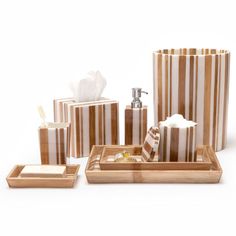 a bathroom set with soap dispenser, toothbrush holder and tissue dispenser