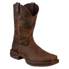 Add some versatile western appeal to your arsenal with the Durango Rebel Western Boots for Men. A great choice for roping, riding, dancing, or relaxing, this sharp-looking boot connects its full grain, antiqued leather upper to its dual-density, rubber/EVA outsoles with double row welt stitching for top toughness. Inside, removable Cushion Flex insoles with contoured and ventilated cushion footbeds provide welcome support and cushioning. Tempered steel shanks provide great stability, while the l Country Boy Outfits, Western Boots Outfit, Suede Cowboy Boots, Western Boots For Men, Ducks Unlimited, Roper Boots, Cowboy Outfits, Mens Cowboy, Mens Boots Fashion