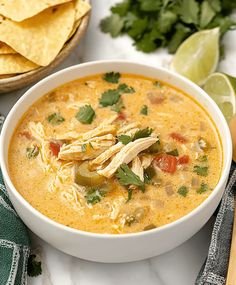 a white bowl filled with chicken tortilla soup