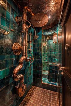 a bathroom with green and gold tiles on the walls, shower head, and faucet