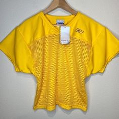 Yellow/Gold Cropped Jersey. Can Fit Women Size As Small Or Youth Large/Extra Large Pit To Pit 20" Shoulder To Hem 22.5" Yellow Cotton Workout Top, Yellow Moisture-wicking Short Sleeve Tops, Yellow Sportswear Top For Workout, Yellow Sporty Tops For Streetwear, Sporty Yellow Tops For Streetwear, Yellow Sporty Crew Neck Tops, Yellow Short Sleeve Sports Top, Yellow Athleisure Tops For Sports, Sporty Yellow Tops For Workout