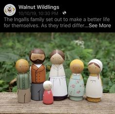 a group of wooden dolls standing next to each other