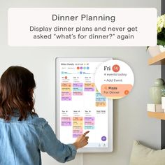 a woman pointing to a menu board with the words dinner planning displayed on it