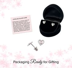 Sterling silver dainty heart earrings with single pink CZ in center that sparkle and shine (6mm) for those girls who love bling! These sweet little earrings come with screw backs so she won't lose them and come packaged in darling gift box!Earrings include an extra hypo-allergenic, anti-tarnish finish to keep your pieces sparkling beautifully for years to come. Pink Sterling Silver Heart Earrings For Mother's Day, Hypoallergenic Pink Sterling Silver Heart Earrings, Hypoallergenic Pink Heart Earrings In Sterling Silver, Heart-shaped Birthstone Earrings For Gift, Cute Silver Heart Earrings As A Gift, Personalized Pink Heart Earrings For Gift, Personalized Silver Heart Earrings For Gift, Silver Birthstone Earrings For Valentine's Day, Valentine's Day Silver Earrings With Birthstone