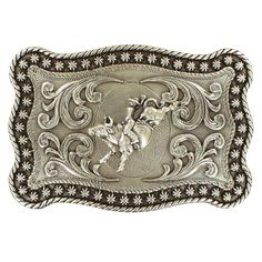 Style number: 3759002 Rectangle belt buckle Antique silver Bull rider in center Western filigree design Rope edge with rounded corners Measures: 4" x 2.25" Bull Rider, Mens Belt, Bull Riders, Western Belt Buckles, Filigree Pattern, Bull Riding, Western Belts, Filigree Design, Pattern Background