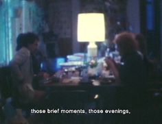 two people sitting at a table in front of a lamp with the words those brief moments, those evenings