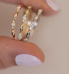 Say hello 🙋🏼‍♀️ to a delightful stackable collection we call the 'tiny trio' ring stack! A beautiful trio in all three color golds sure to make anyone say 'yes please'. These beauties are perfect as a set or can be purchased separately and paired with virtually any existing stackable collection you may have. 14K rose, yellow or white gold 0.69 ct. total (tiny trio) For any non-stock finger sizes please allow 2 - 3 week delivery. Three Band Wedding Ring Set Simple, Trio Rings, Wedding Ring Sets Simple, Sister Rings, Trio Ring, Stackable Diamond Rings, Sister Jewelry, Diamond Stacking Rings, Ring Trends