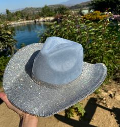 "Blue, purple, pink, black, ivory, or iridescent purple cowboy cowgirl hat with rhinestones on top and stars on the bottom of the brim. This is one size fits most, there's a drawstring to adjust sizing.  ships in 2 business days! Stunning in person  Perfect for Coachella , stagecoach, Nashville, country concerts, bachelorette parties, brides, weddings Please note that the hats are handmade and may have some variances and blemishes. If any, they are very minor . The hats might have a bit of \"sti Cowgirl Hat With Rhinestones, Rhinestone Cowboy Hat, Cowgirl Hats Western, Bling Boots, Wedding Cowboy Boots, Nashville Country, Space Costumes, Rhinestone Cowboy, Custom Cowboy Boots