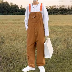 Adopt an authentic style with our men's overalls      Discover our vintage style men's overalls , perfect for those who want to stand out with a retro touch . Designed with high-quality materials, these overalls not only offer a trendy look but also optimal comfort.   These versatile vintage overalls can be paired with a variety of tops, from simple tees to elegant shirts. Available in multiple sizes and two colors, they fit all styles and body types. Wear them with sneakers for a casual look or with ankle boots for a more sophisticated look.   Details of the Men's Casual Overalls     Vintage style   Material: denim   Size: M - XXL   Color: orange, blue   Decoration: pockets   Limited quantity   Free shipping      Size chart                Size    Waist size    Hip    Length Sweat Vintage, Men's Overalls, Overalls Vintage, Vintage Overalls, Overalls Men, Mens Overalls, Casual Cargo Pants, Basket Vintage, Simple Retro