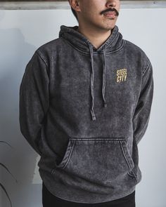 Gold Steel City Renegade Logo on Mineral Wash Hoodie Soft-washed Cotton Hoodie, Casual Acid Wash Soft-washed Sweatshirt, Sporty Acid Wash Soft-washed Sweatshirt, Soft-washed Cotton Hooded Sweatshirt, Urban Washed Black Cotton Hoodie, Washed Black Cotton Urban Hoodie, Faded Cotton Hoodie Sweatshirt, Casual Faded Distressed Hoodie, Acid Wash Hooded Soft-washed Sweatshirt