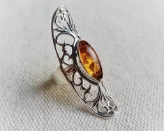 Treat yourself or treat yourself Large and beautiful ring made of 925 silver and natural amber. It is entirely made by hand. It is very bright, very good quality! It will be shipped in a small fabric pouch. Total height of the ring: 4.3 cm Width of the ring: 1.5 cm Height of the stone: 1.6 cm Width of the stone: 0.9 cm The shipment will be fast and neat. Visit the NEPALMASHOP store for more jewelry and ethnic findings! Namaste! Fabric Pouch, Natural Amber, Amber Stone, Beautiful Ring, Multi Stone Ring, Ethnic Jewelry, Multi Stone, Boho Rings, Stone Ring