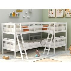 there is a bunk bed with two sets of ladders on the top and bottom