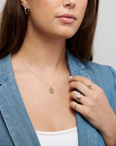 14k solid gold 6 round, natural diamonds: Total carat weight: approximately 0.018 Color: G-H Clarity: SI Pendant dimensions: Length: 15 mm Width: 15 mm Thickness: 1.25 mm Pendant bail dimensions: Height: 6 mm Opening: 3 mm Diamond Cut Cable Chain Length: 16-18 inches, adjustable Width: 0.9 mm Lobster clasp closure Please specify your engraving request in the Engraving section and refer to the text boxes for each placement's character limit. Important to note: This product includes the pendant an Stamped 14k Diamond Fine Jewelry, Classic 14k Gold Diamond Necklace With Round Pendant, Recycled Gold Medallion Jewelry For Anniversary, Anniversary Recycled Gold Medallion Jewelry, Anniversary Medallion Recycled Gold Jewelry, Anniversary Medallion In Recycled Gold, 14k Gold Pendant Charm Necklace With Diamond Accents, Round White Gold Charm Necklaces With Diamond Accents, Minimalist Jewelry With Diamond Accents And Initial Pendant