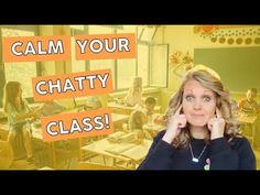 a woman is talking on her cell phone in front of a classroom full of students